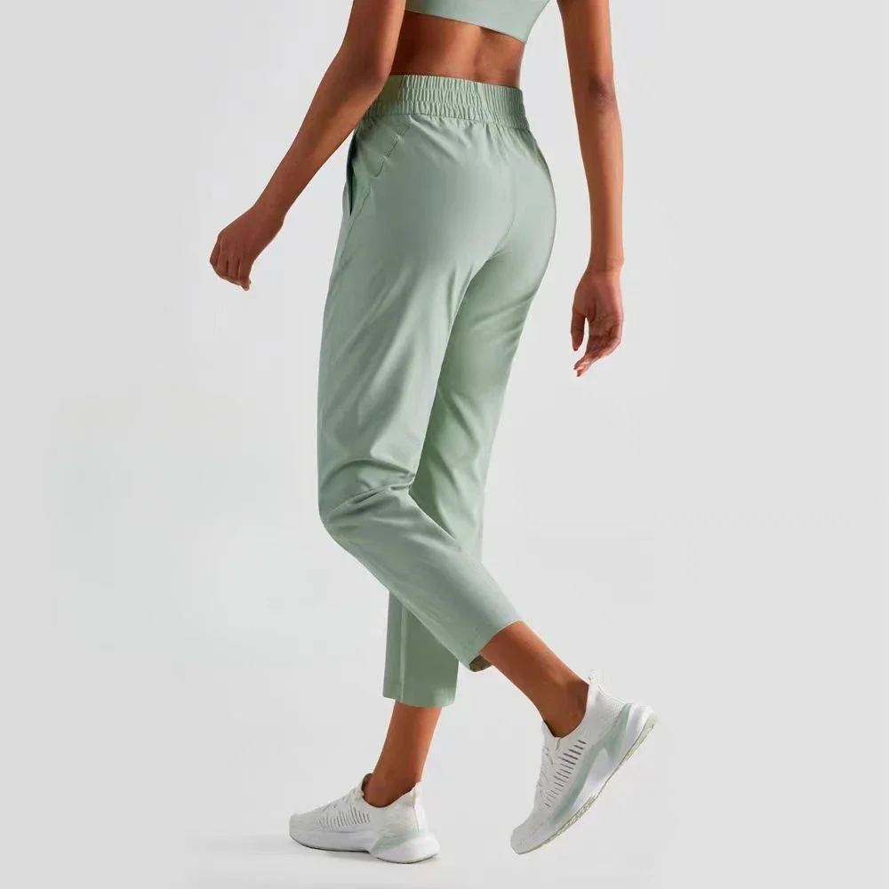 Lemon-Pantalones deportivos de secado rápido para mujer, pantalón de Yoga de longitud hasta la pantorrilla, de tiro alto, con bolsillos, ligero, informal, 23"