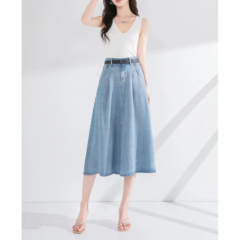 Koreańska wersja nowej modnej cienkiej spódnicy jeansowej z tencela. Damska nowa wiosna/lato luźna sukienka dżinsowa z wysokim stanem