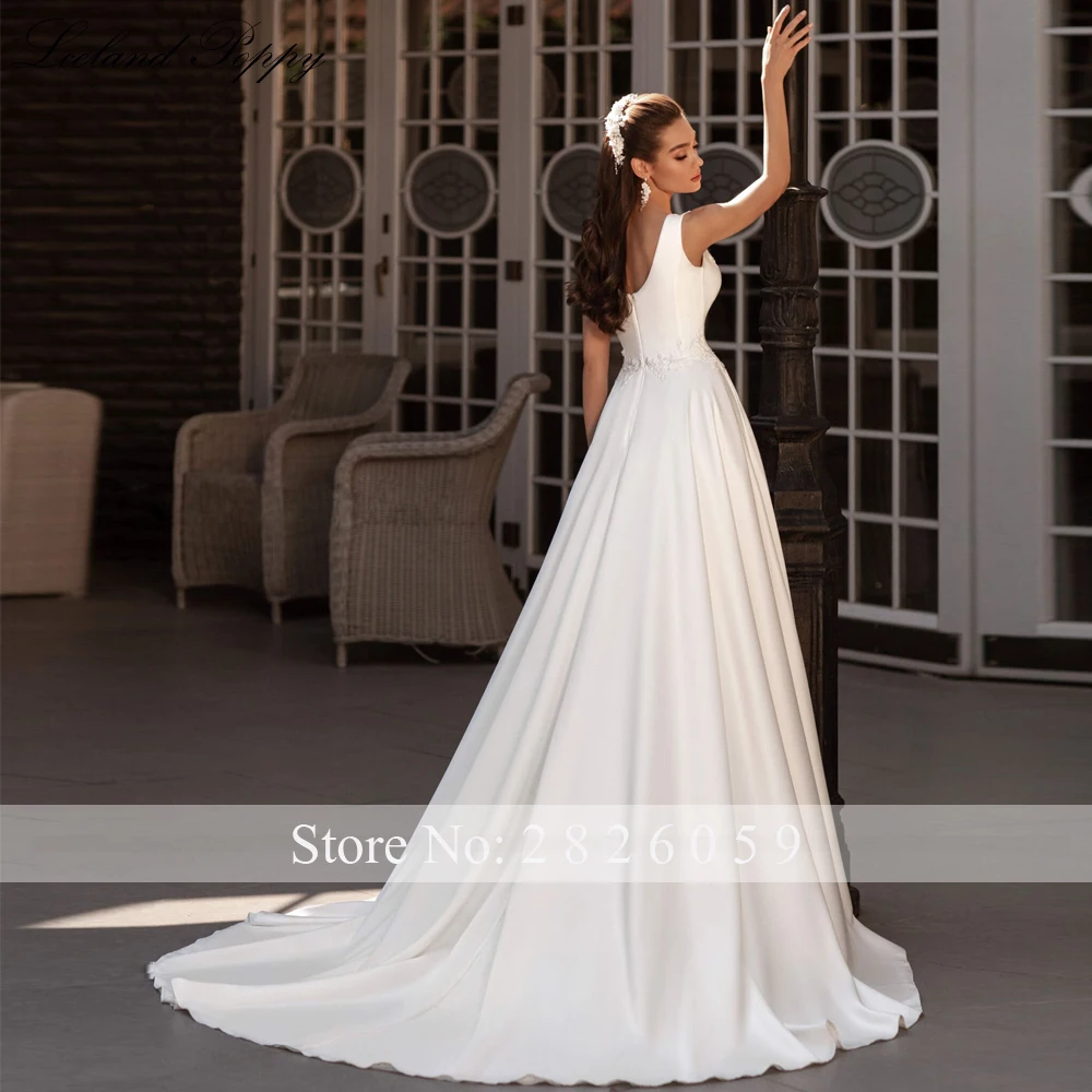 Lceland Poppy Customized A Line V Neck Satin Wedding Dresses Sleeveless Beaded Bridal Gowns with Court Train