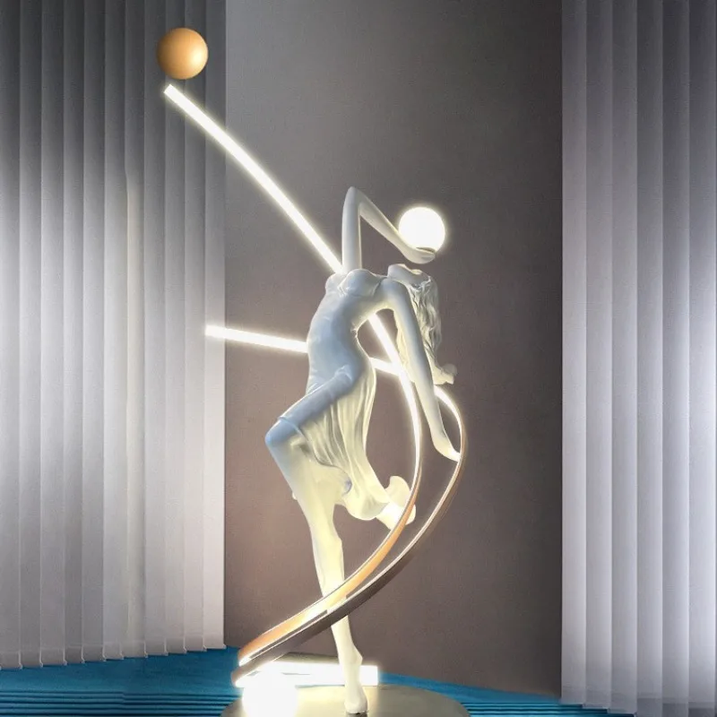 Modern creative dancing in the light, figure luminous lighting, floor-to-ceiling sculpture ornament in the hall