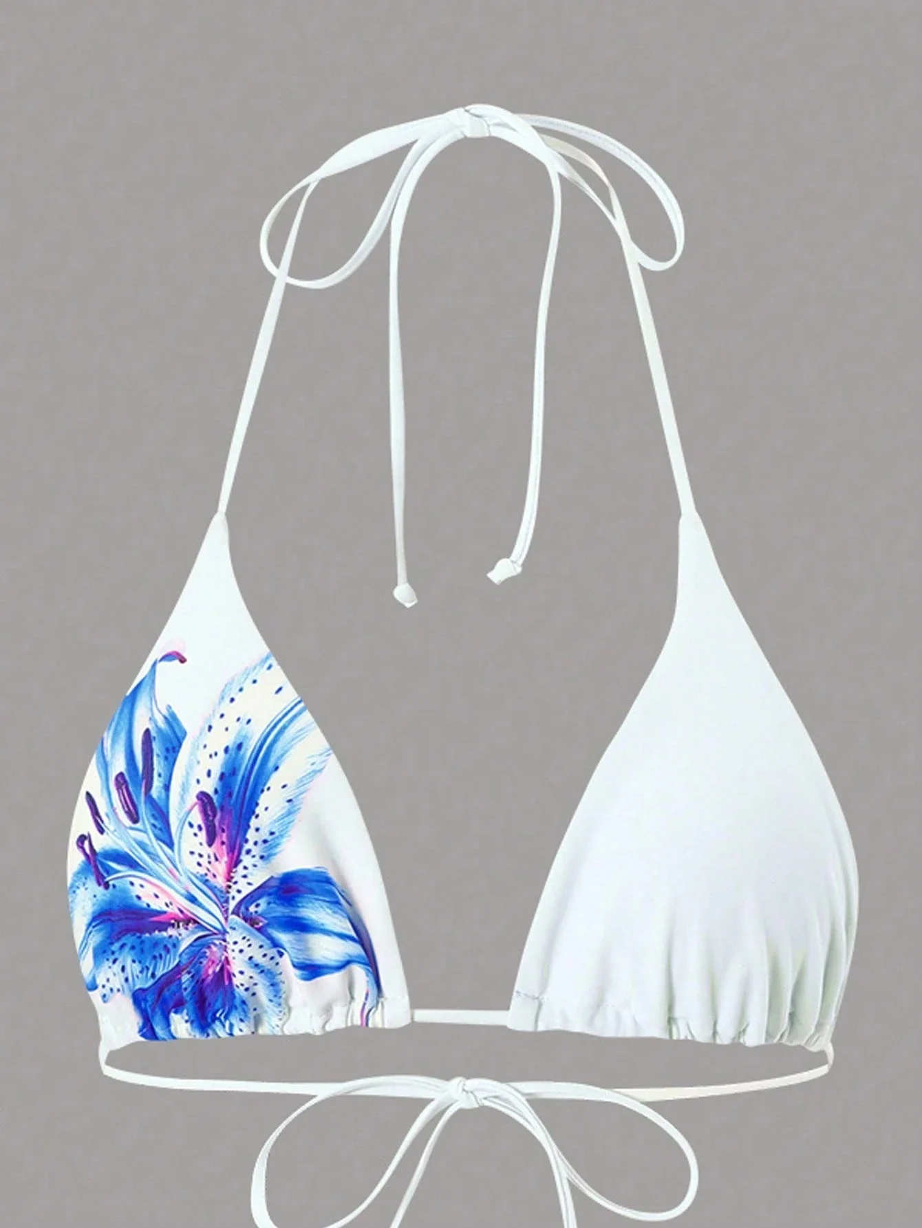 

Женский комплект купальников из 3 предметов: топ-треугольник, плавки на завязках и юбка-накидка с цветочным принтом