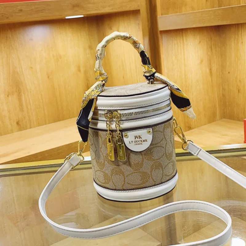 Popular retro rice barrel women all kinds of senior sense FVK barrel bag carrying shoulder messenger bag classic style