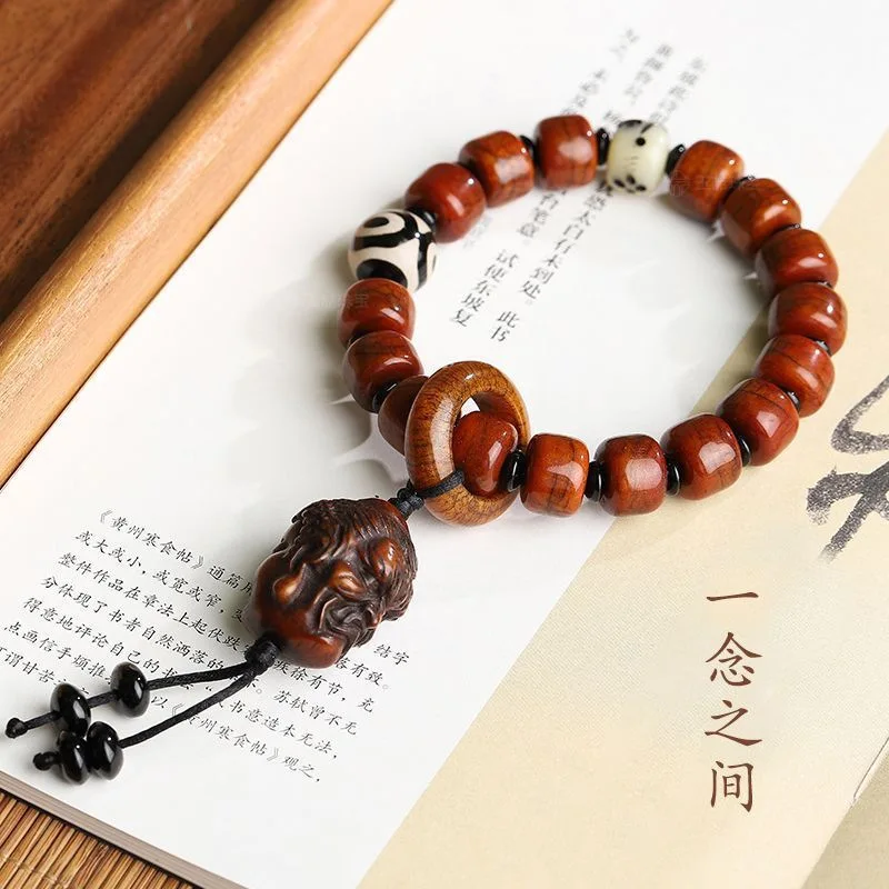 

Одна мысль, трехглазый Дзи, кулон из бычьей кости Будды, тупой браслет из бисера