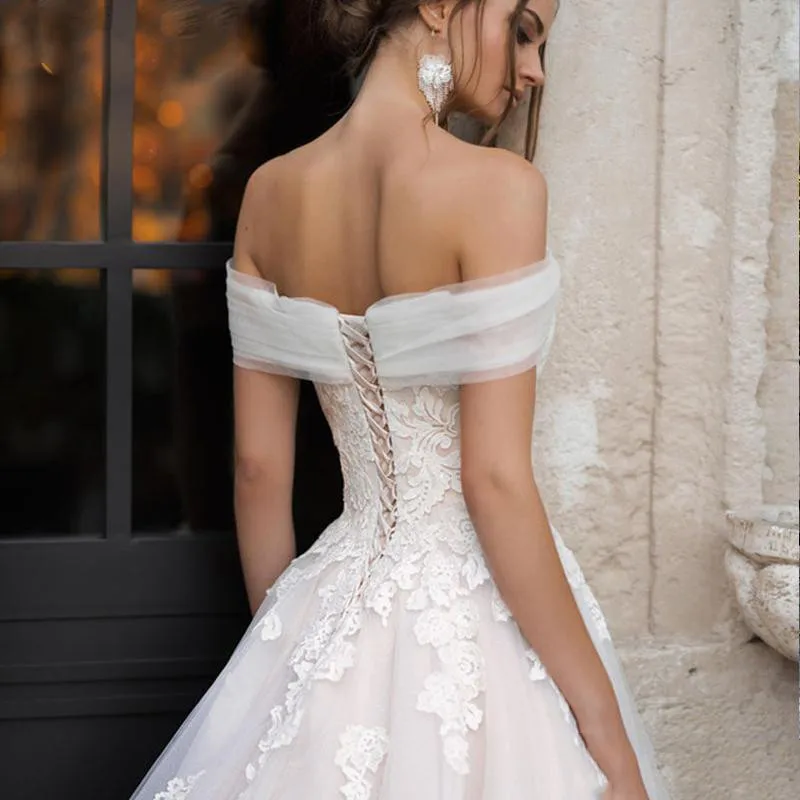 Abiti da sposa rosa con lacci di lusso 2024 abito da ballo Sexy scollo a barca abito da sposa in pizzo di Tulle con pieghe senza schienale Vestido De Novia