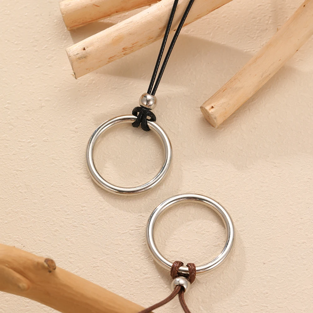 Bohemian Simple Alloy Exaggerated Hollow Circle Pendant Necklaces for Women Hand-woven Leather Cord Beach Vacation Party Jewelry