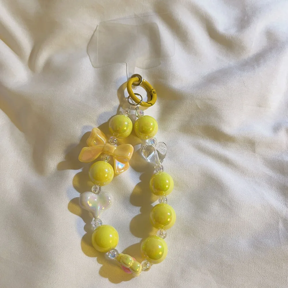 معكرون الحب القوس عقدة الهاتف المحمول الحبل مكافحة خسر الساحرة جراب هاتف قلادة حزام المعصم الموضة للنساء