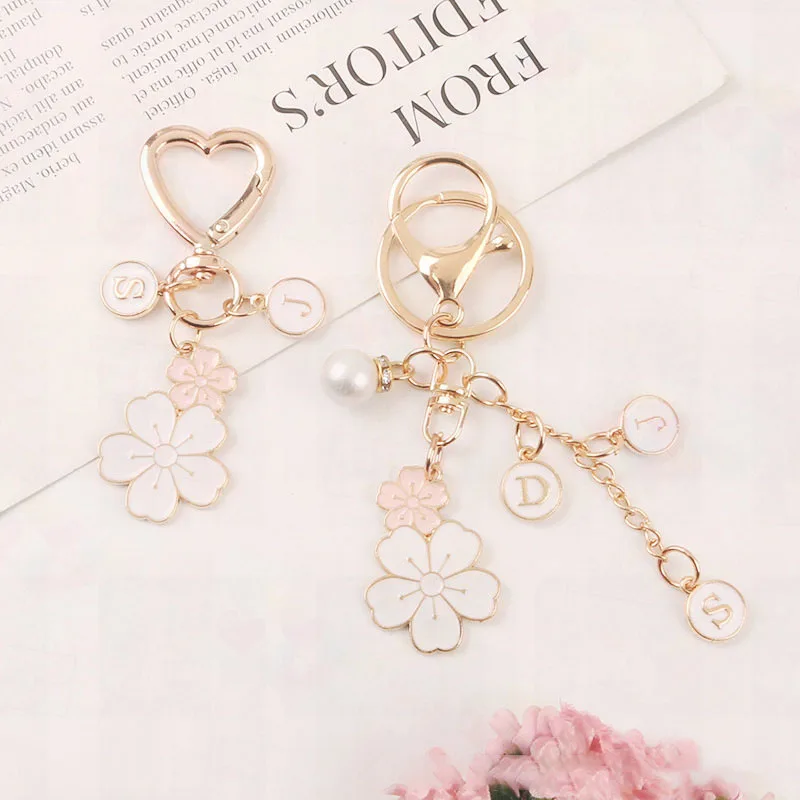 Creative Twin Flower Keychain Cute White Flower Letter Pearl Key Ring Love Key Ring Headphone Cover Bag Hanging Decoration Gift