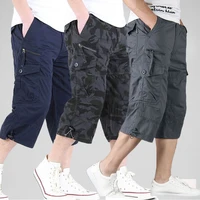 Pantalones cortos Cargo 100% de algodón para hombre, pantalones informales sueltos de Color sólido, cintura elástica, pantalones cortos multibolsillos de talla grande para exteriores para primavera y verano