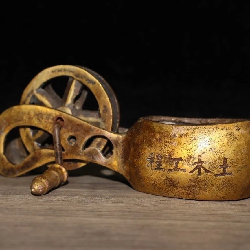 

Ancient and old-fashioned woodworking marking tools, civil engineering, pure copper ink bucket, brass, old objects