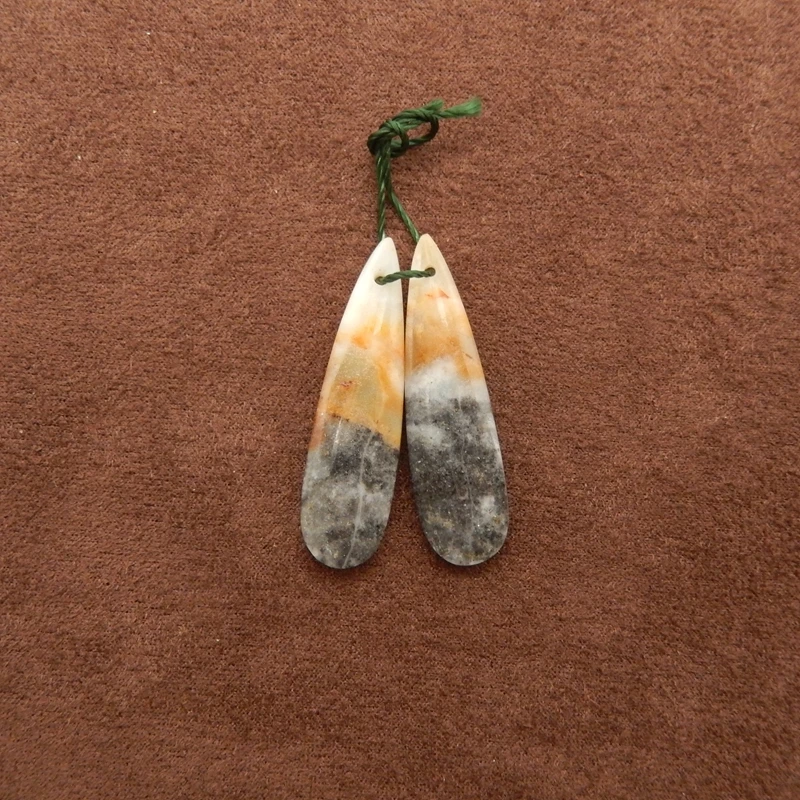 

Пара длинных сережек-капель из полированного амазонита — натуральный многофункциональный драгоценный камень с оранжевыми и серимыми включениями для ремесленных ювелирных изделий