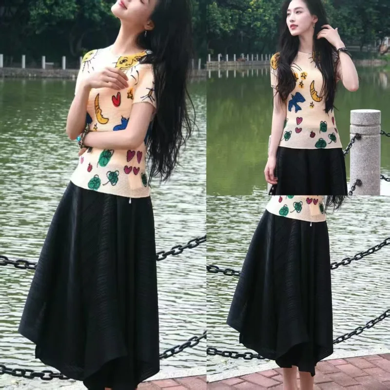 

Miyake Pleated Skirt Sets Cartoon Print Plisse T-Shirt Women 2026 Summer Pleat Design Sense Slim Age Reducing Pants Skirt Set