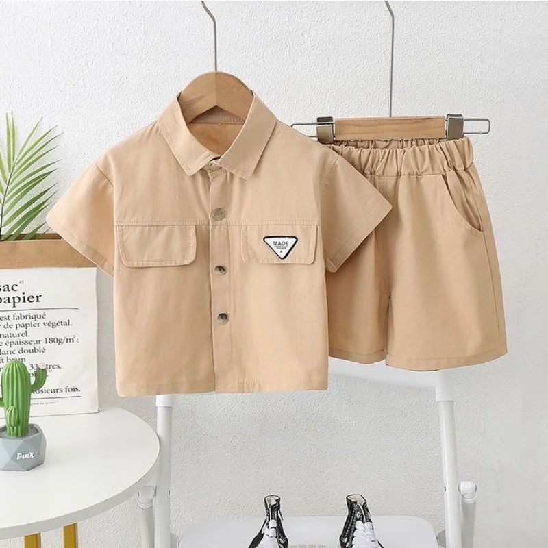 

2023 Children Clothing Summer New Fashion Trend Short Sleeve Handsome Korean Version Lapel Solid Color Shirt Sets Two Pieces