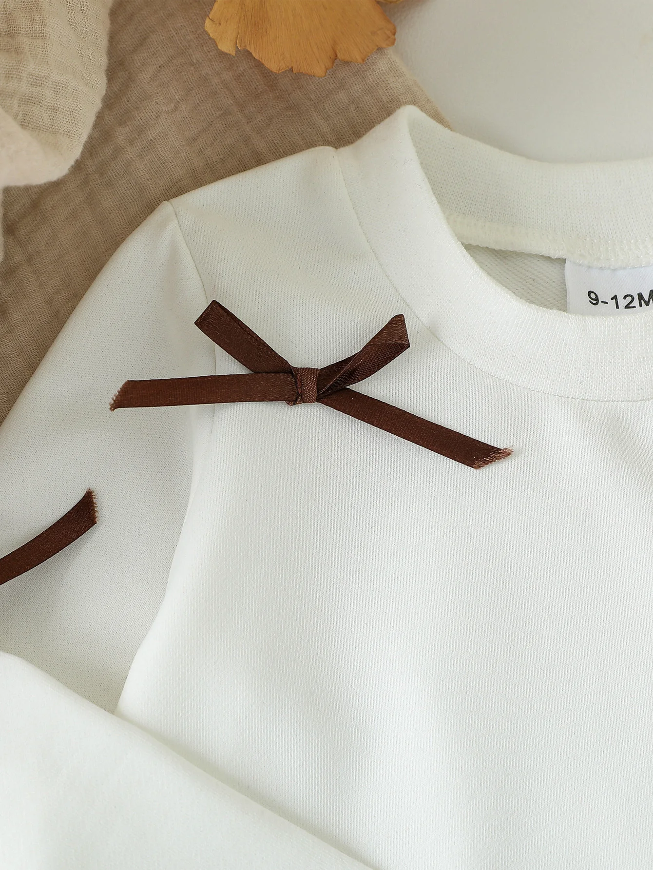 طفل الفتيات الملابس مجموعة ربيع الخريف نمط قصير القوس كم طويل أعلى + تنورة جلدية قصيرة 2 قطعة ل 3-24 متر الفتيات الزي الأنيق