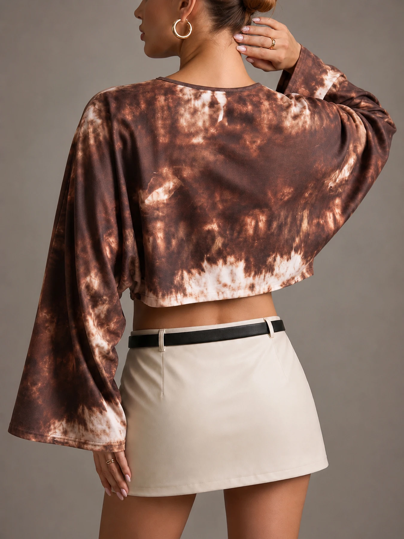 Women's tie-dye flared sleeve cropped top with abstract marble print, lightweight layered top