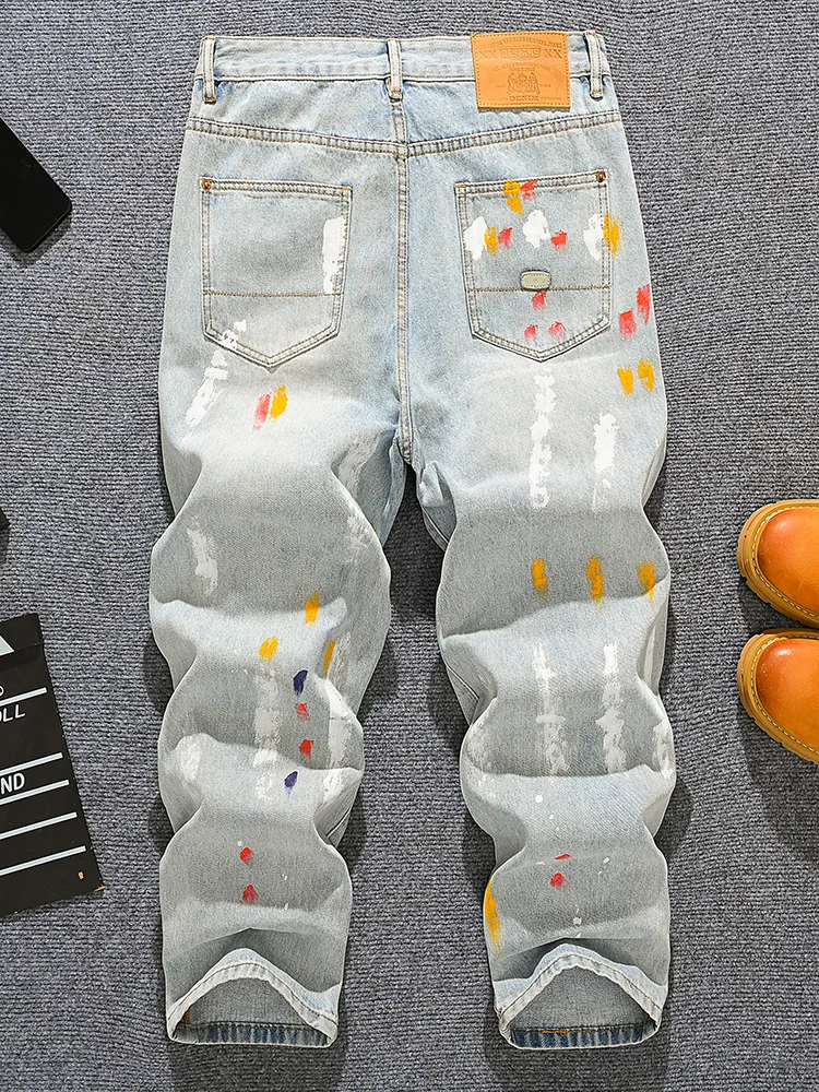 Spring and summer loose straight leg jeans for men, splashed ink dot paint print, fashionable distressed patch, wide leg pants