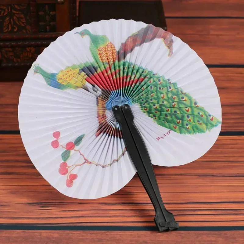 Abanico de papel plegable de estilo chino aleatorio, molino de viento Retro, papel redondo pequeño, decoración de Color, abanicos de papel, regalo de mano impreso para fiesta, 1 ud.