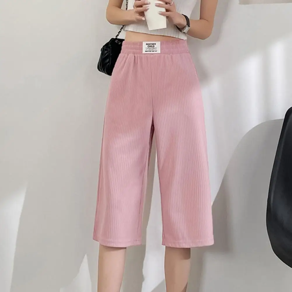 

Women Cropped Pants Streetwear Summer Ice Silk Cropped Pants with Elastic Waist Pockets Loose Fit Wide Leg Mid-calf Length Solid