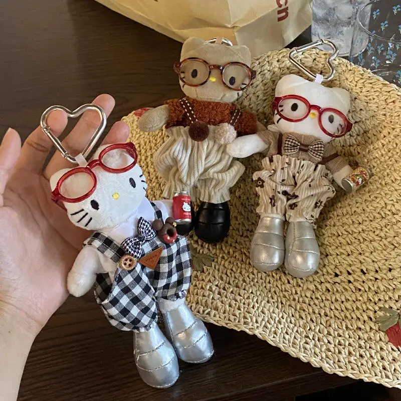 Sanrio salopette pour Hello Kitty porte-clés en peluche dessin animé lunettes créatives portant une poupée à longues jambes sac à dos fermeture éclair pendentif décoration
