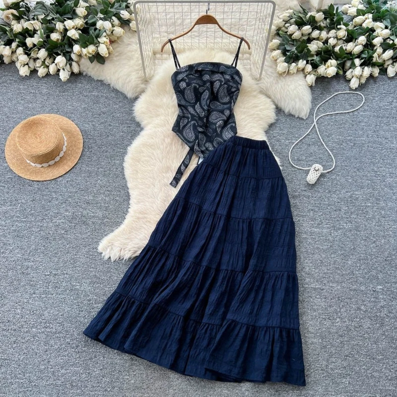 

French gentle style two-piece set women's summer new printed design sense irregular camisole vest solid color long skirt