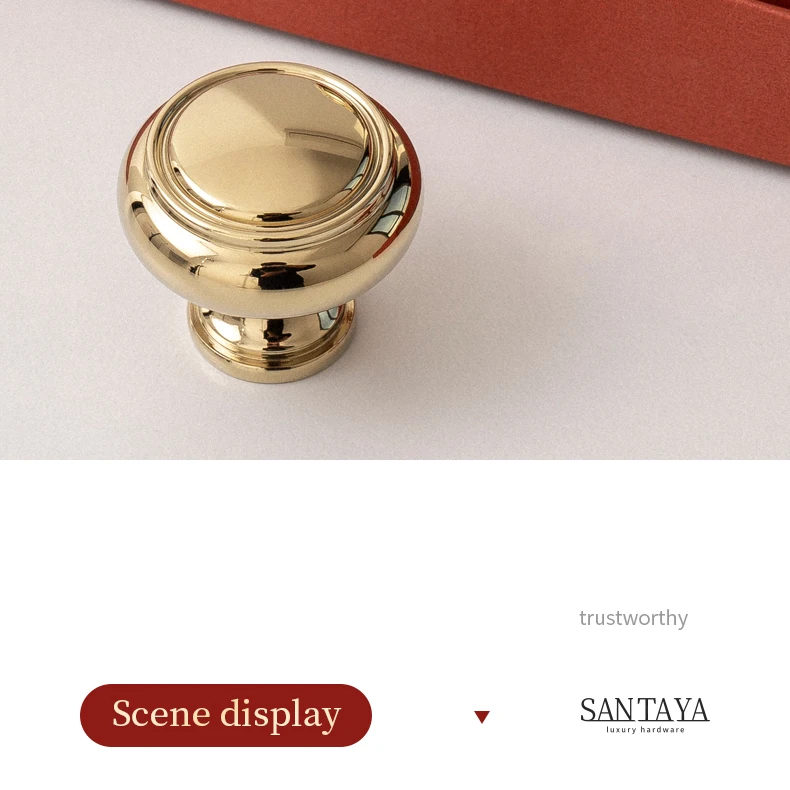 Round gold cabinet knob shown from above