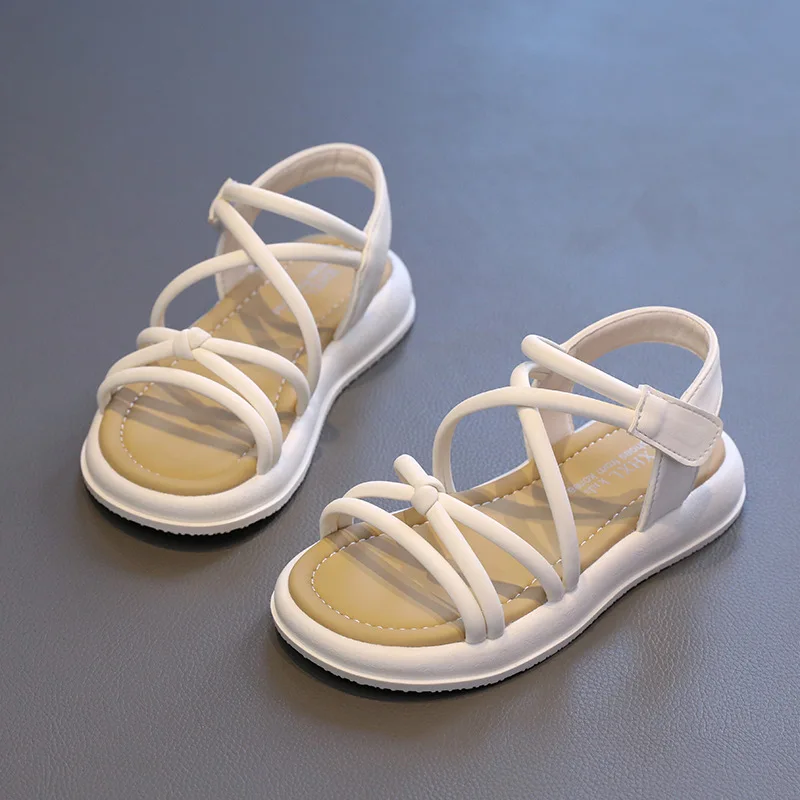 Sandalias de verano de Color sólido para niña, zapatos informales versátiles para la escuela, sandalias de playa con recortes cruzados, suaves y antideslizantes