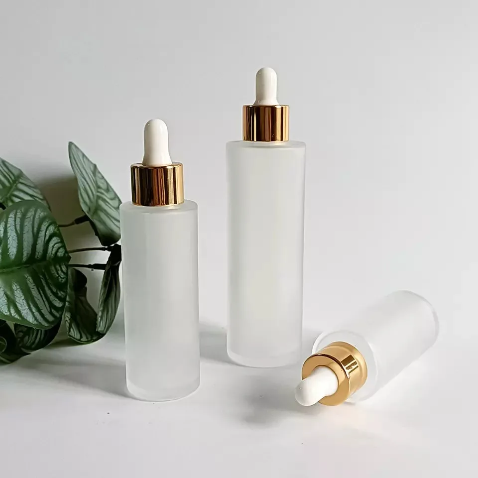 

High Quality 20ml-100ml Empty Frosted Flat Shoulder Glass Customized Essential Oils Perfume Serum Dropper Bottles With Gold Lid