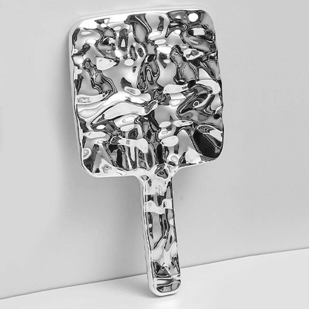 Handheld make-upspiegel Zilver Draagbaar High-Definition reflecterend oppervlak Gegalvaniseerde afwerking Stijlvol accessoire voor dames