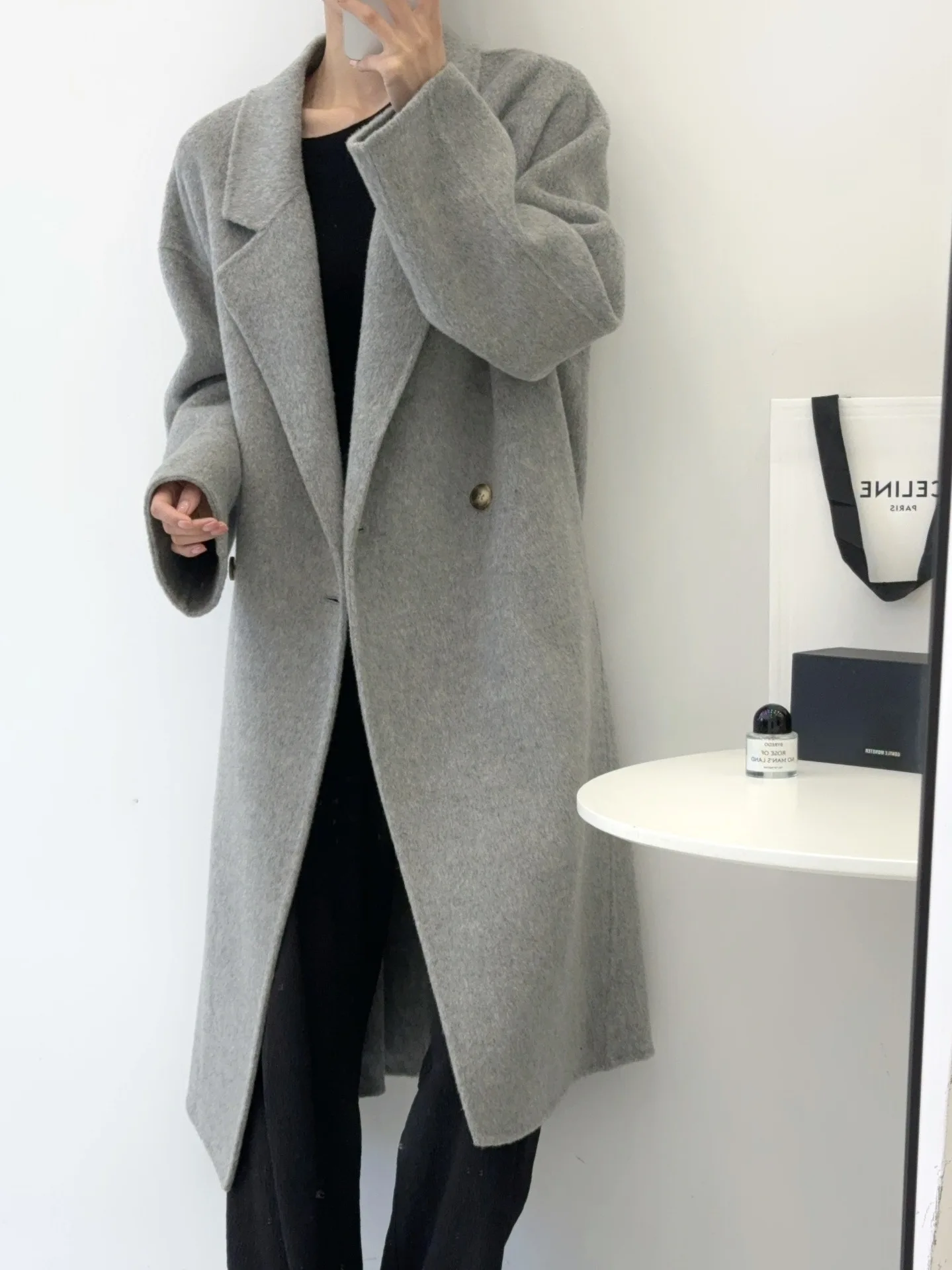 Autumn and winter women\'s casual solid color lapel long sleeved loose long coat