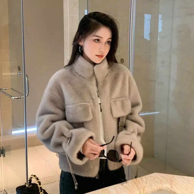 Winter nieuwe nepbontjas luxe merk imitatie nertsenbont jas dames korte pluche top rits warme bovenkleding ontwerp jas