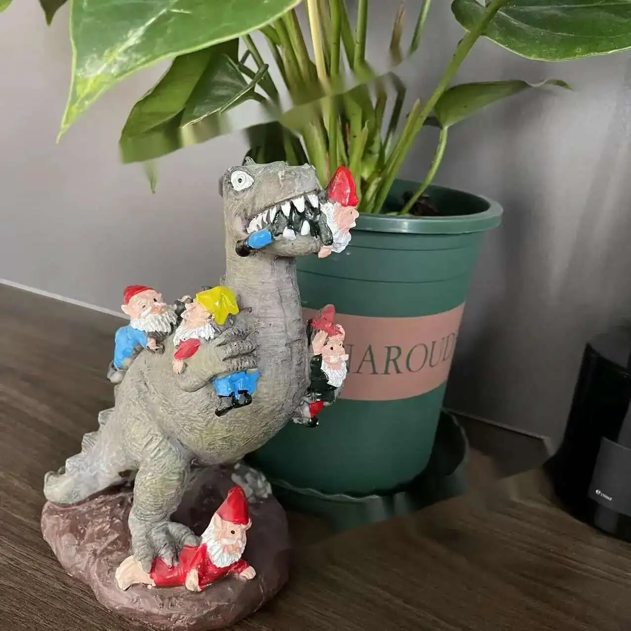 

Dinosaur Eating Dwarf Decoration Resin Crafts Dinosaur Eating Dwarf Garden Art Decoration