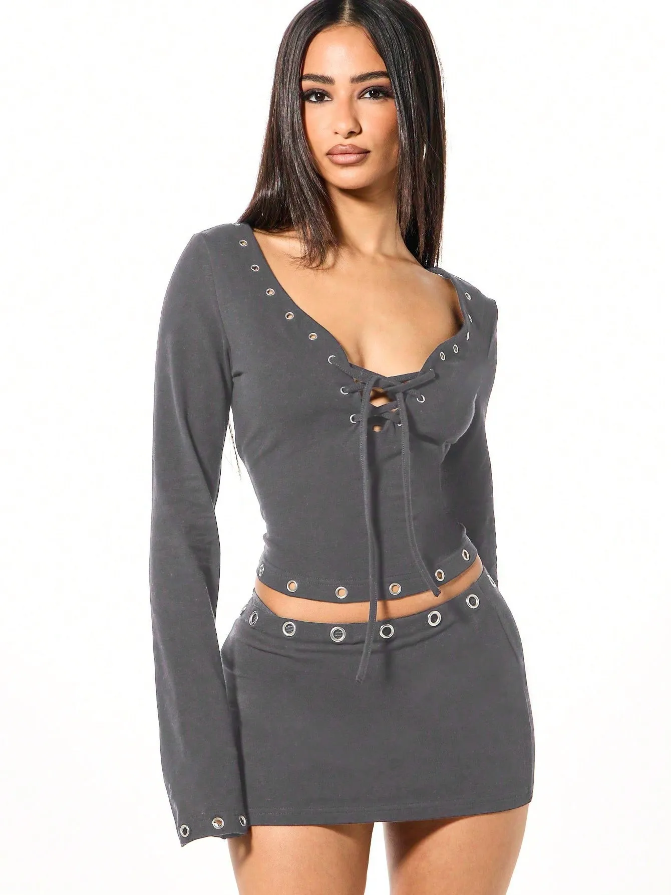 

2026 Casual fashion new solid color minimalist two-piece slim low-cut long-sleeved top tight bag hip skirt spice girl style suit