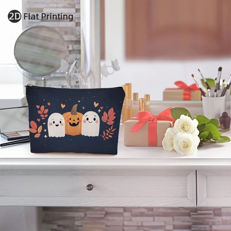 Urocza kosmetyczka z motywem ducha i dyni - wielofunkcyjna saszetka na zamek błyskawiczny, etui na biżuterię, idealna mała kosmetyczka podróżna na zamek błyskawiczny.