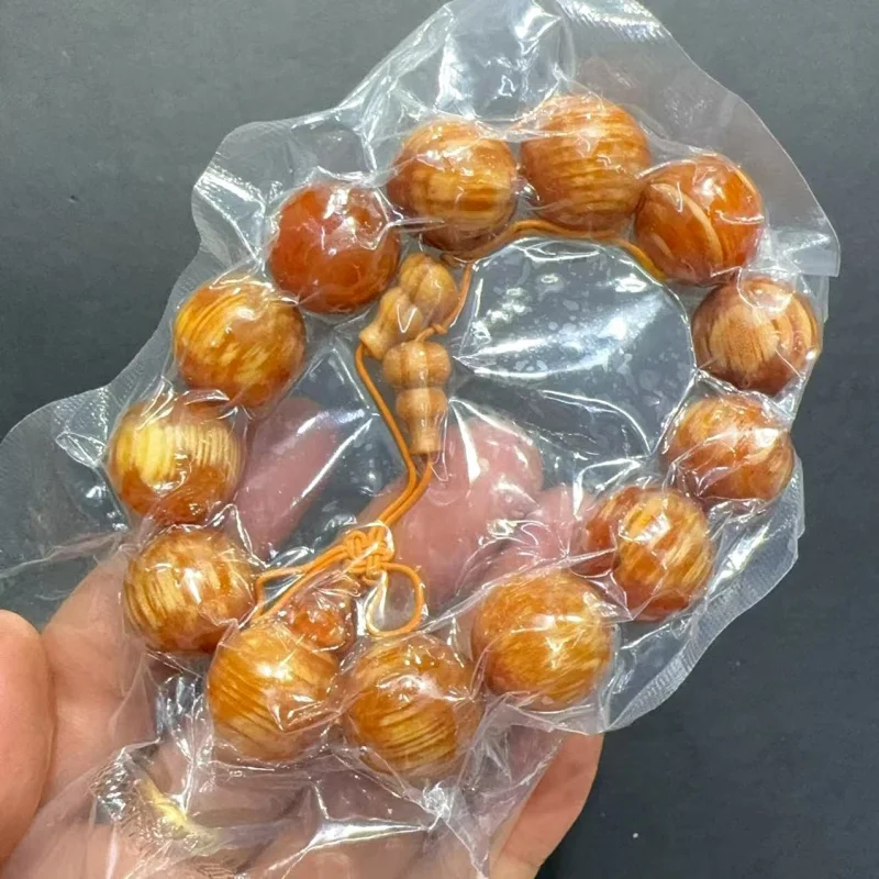 Pine cone bracelet, Nannu Changbai Mountain northern agarwood, amber , fully translucent blood dragon wood Buddhist bea