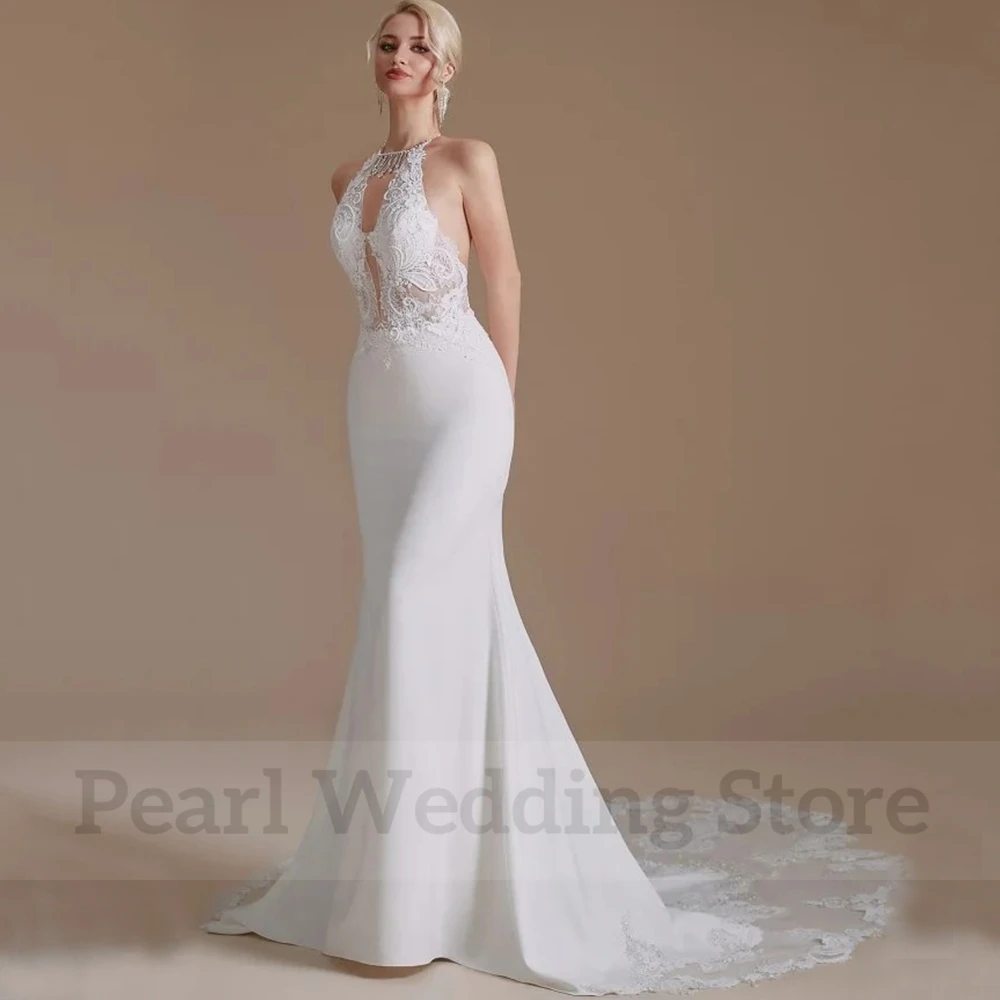 Modern Sleeveless Mermaid Wedding Dress Delicate Applique Halter Sexy Open Back Bridal Floor Length Sweep Train Gowns Robe