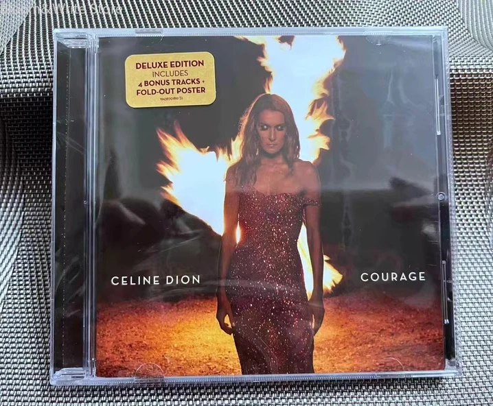 

Классический музыкальный CD-диск Celine Dion: альбом "Courage Deluxe", музыкальная запись "Falling in Love Again", музыка для Walkman, автомобильные саундтреки, музыка для вечеринок в коробке