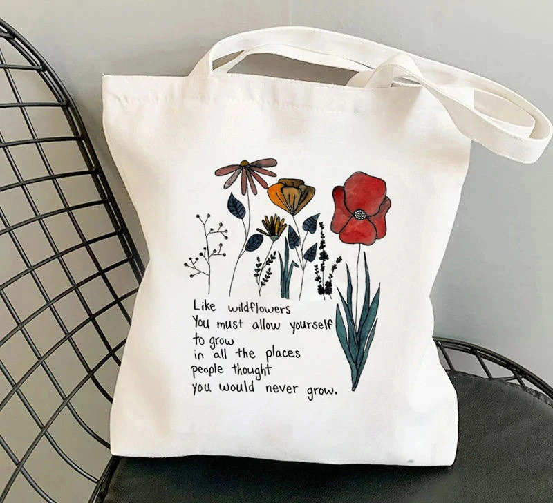 Artistic Floral Pattern Canvas Tote Bag With Vibrant Wildflower Inspirational Text Designs Stylish Versatile Shoulder Bag