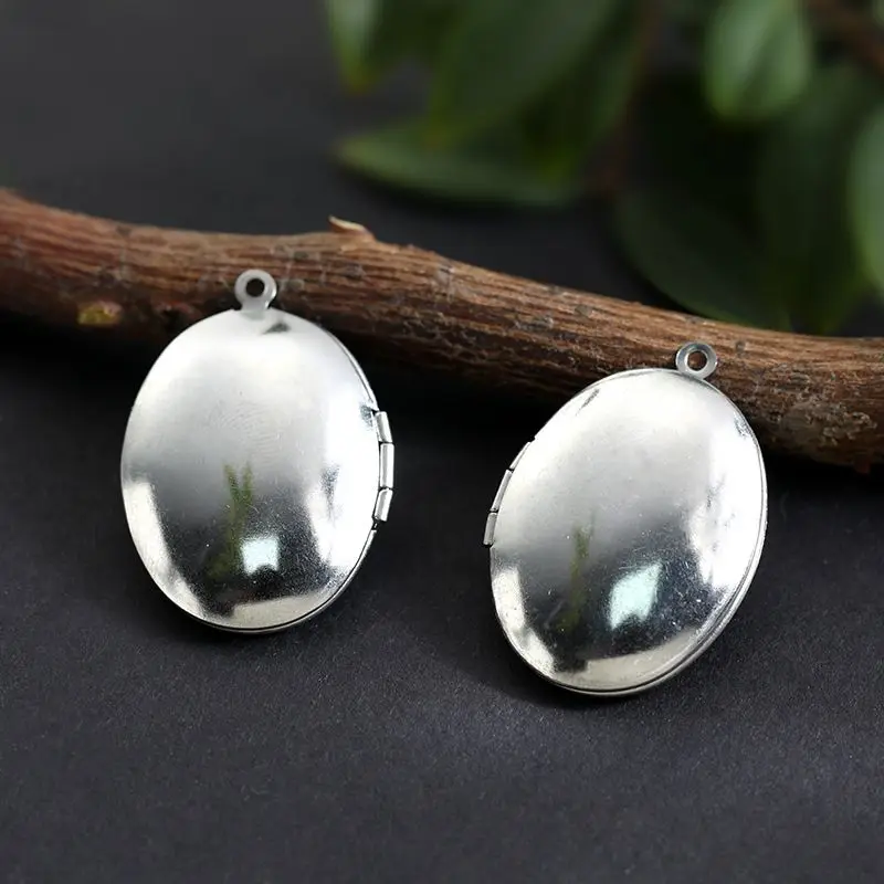 

20Pcs/Lot 24*33.5mm DIY Stainless Steel Picture Photo Locket Frame Pendants Oval Photo Locket Charm Penddant