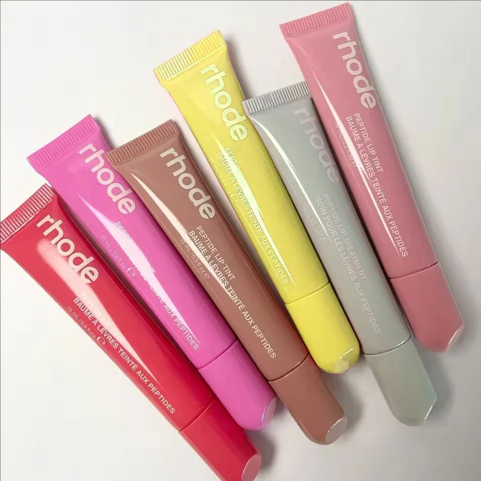 Brillo de labios de moda Popular, esencia rica e hidratante, brillo de labios, producto de cuidado nutritivo de larga duración, lápiz labial de cinta portátil