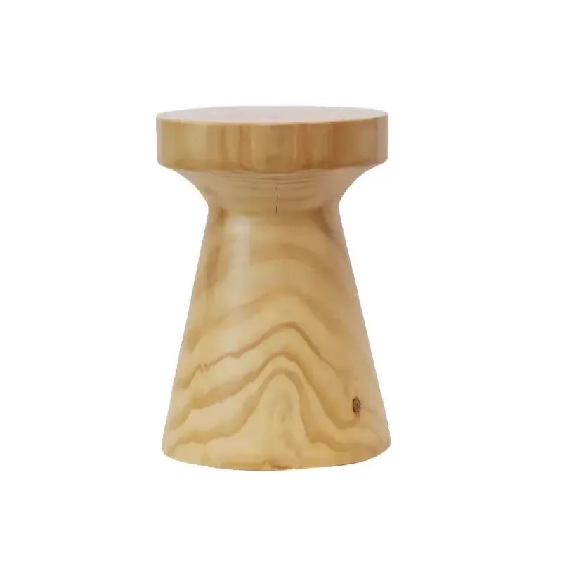 

log piers, a few round ornaments, stump low stools, stump hotel bedside tables