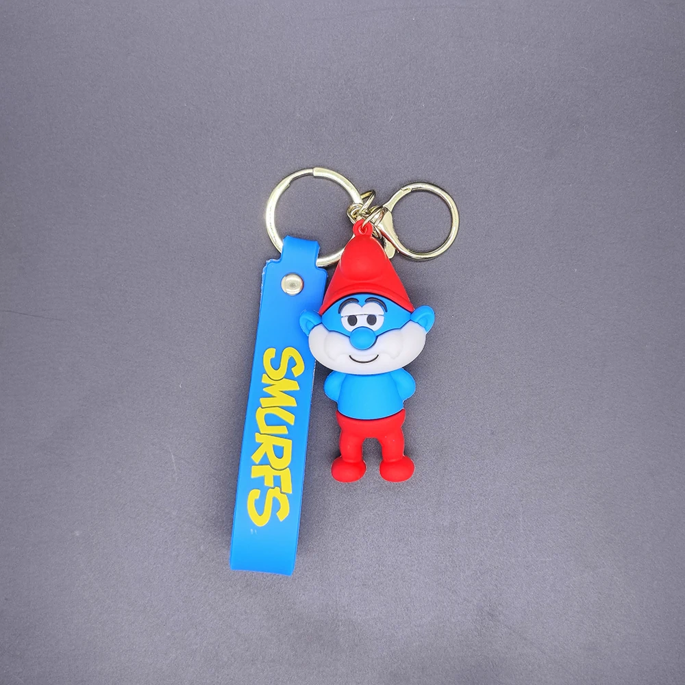 Creative Cute Q Version Cartoon Figure The Smurfs Car Key Chain Small Gift Bag Hanging Ornament Mini Smurfs Small Accessories