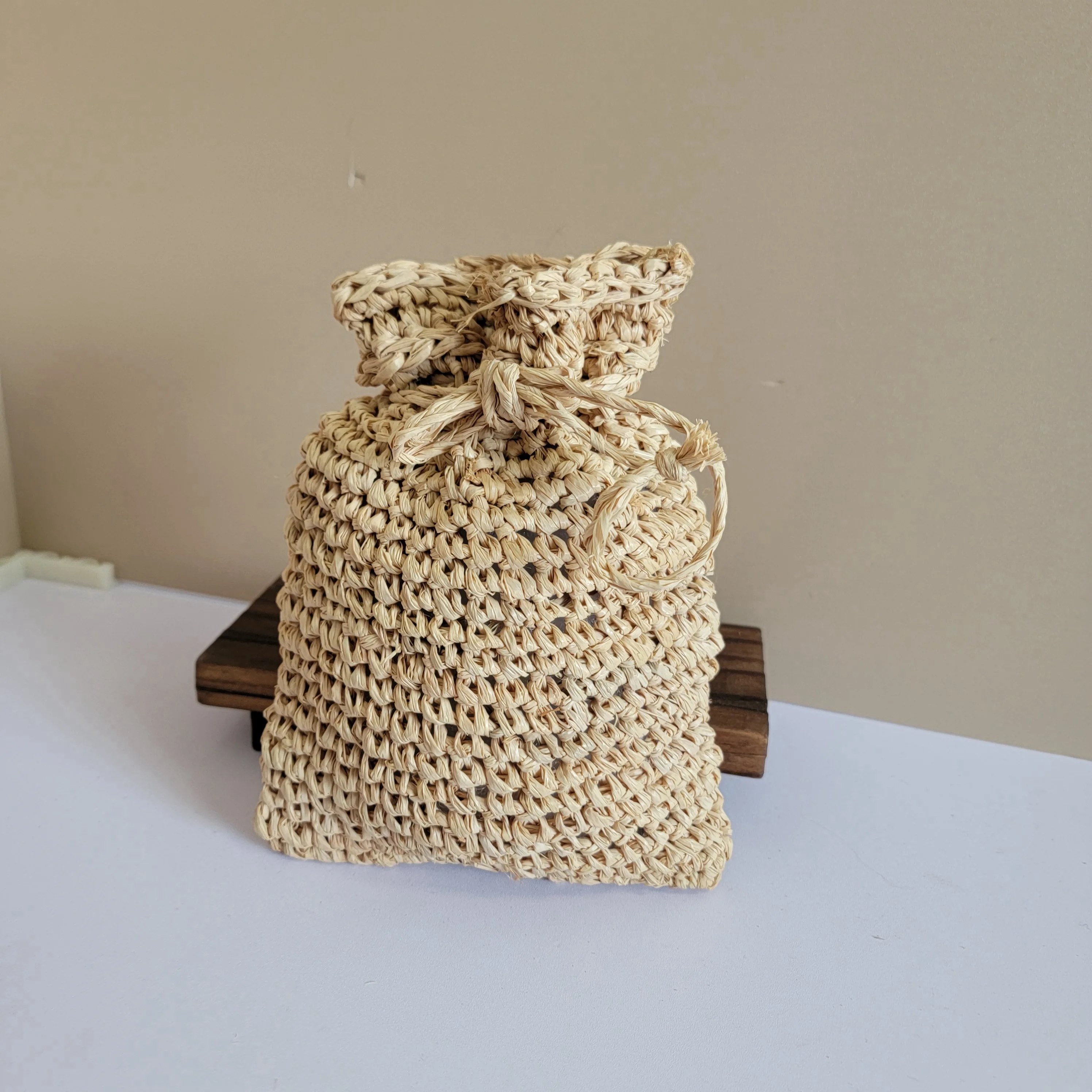 Picture 4: RAFFIA storage bag- drawstring bag