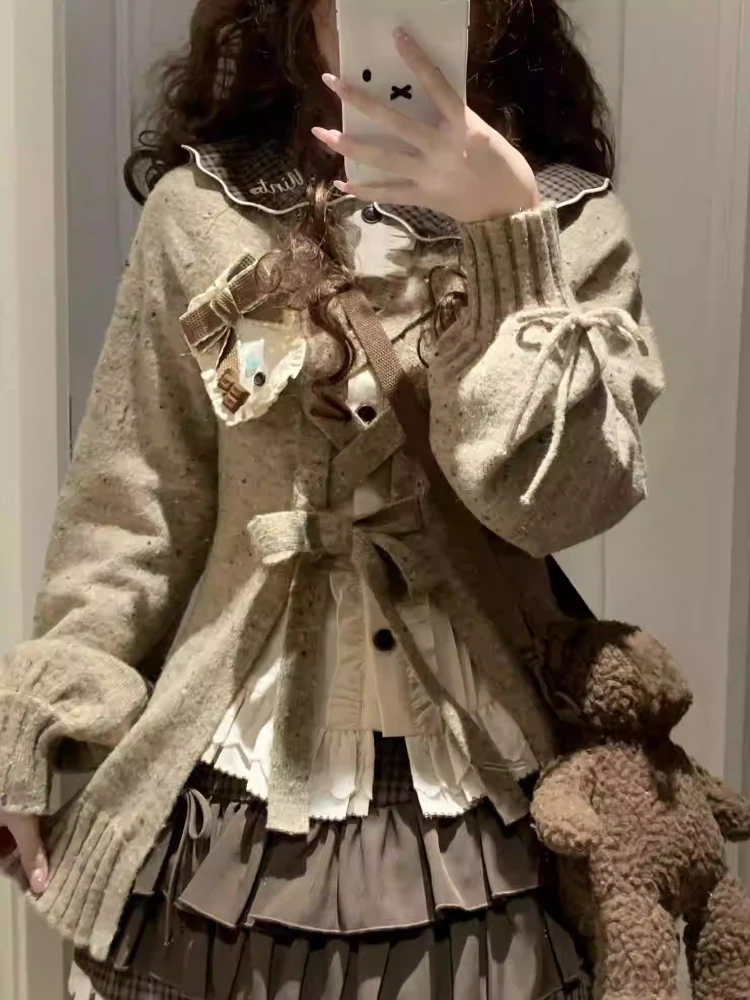 

2025Love Bo Qiao Autumn/Winter New Style Japanese Design Fold Wearing Bow Sweater Temperament College Half Skirt Three Piece Set