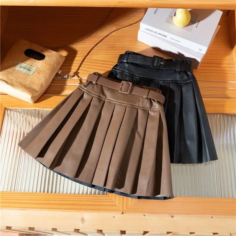 

Girl's short skirt design belt short skirt high waist slimming children's college PU solid color high waist pleated skirt