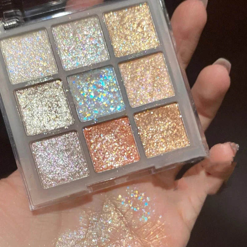 อายแชโดว์ 9 สีแวววาวพาเลทท์แชมเปญสีชมพูมุกอายแชโดว์ชิมเมอร์ไฮไลท์โทนเย็นแต่งหน้าประกายตาที่มีเสน่ห์