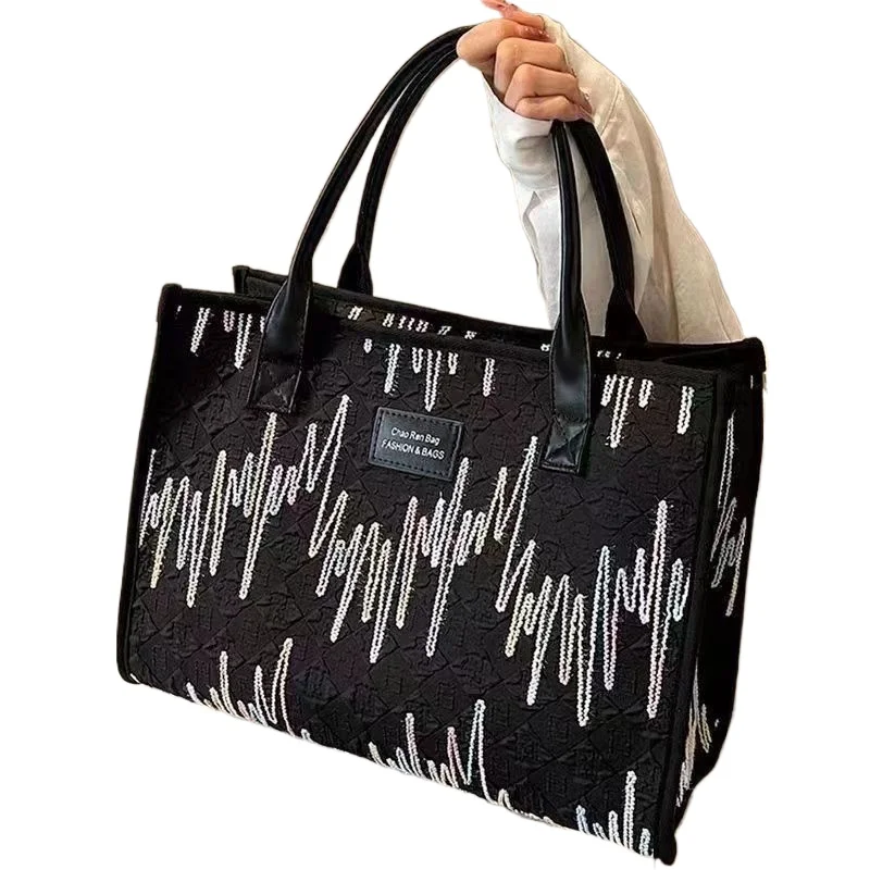 

Versatile Women's Handbags 2026 Pack Women's New High-end Fashion Portable Shoulder Commuter Mommy Tray Going Out Tote Bag Light