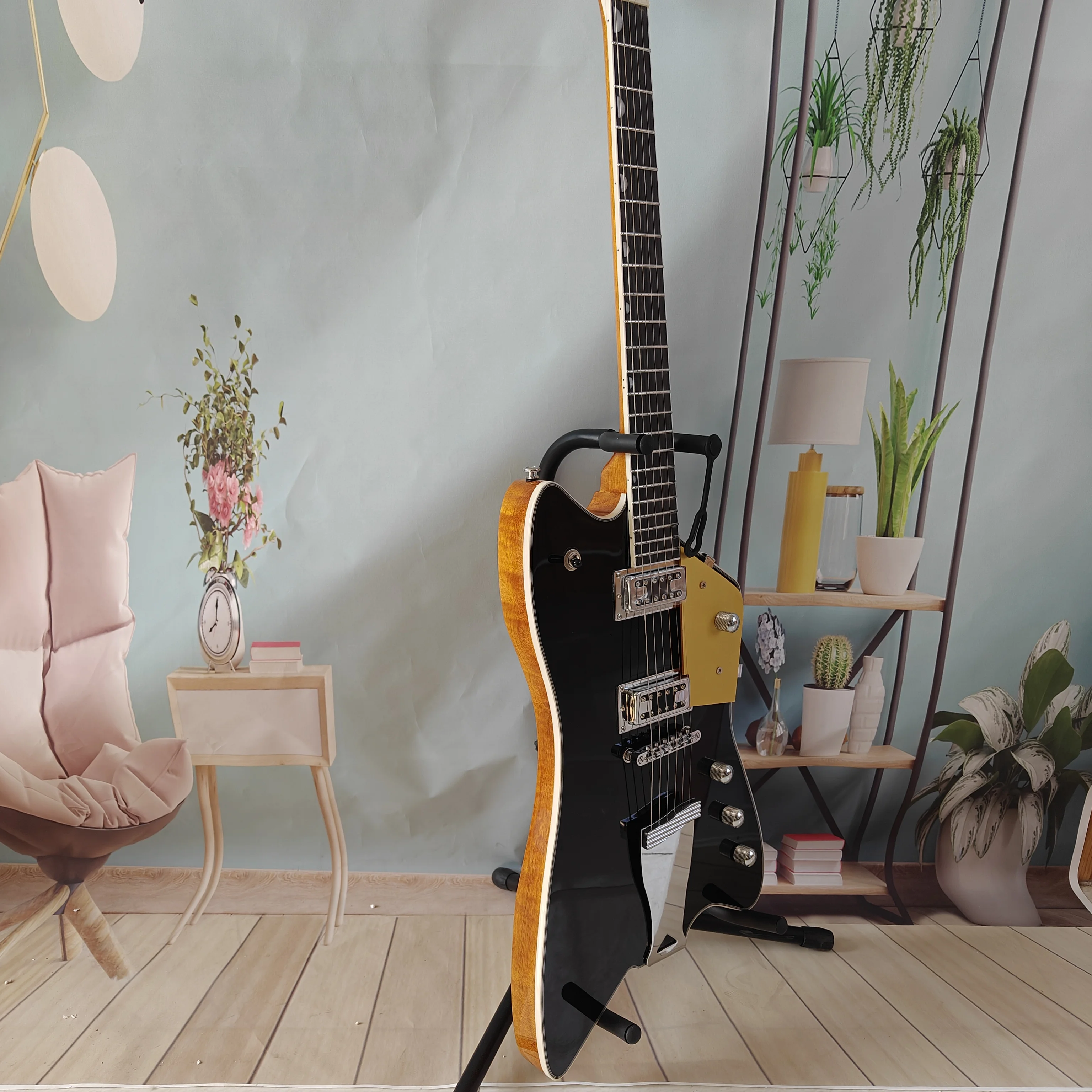 

A high-quality acoustic-electric guitar, solid wood body, stainless steel frets, rosewood fretboard, right-handed, 22 frets and