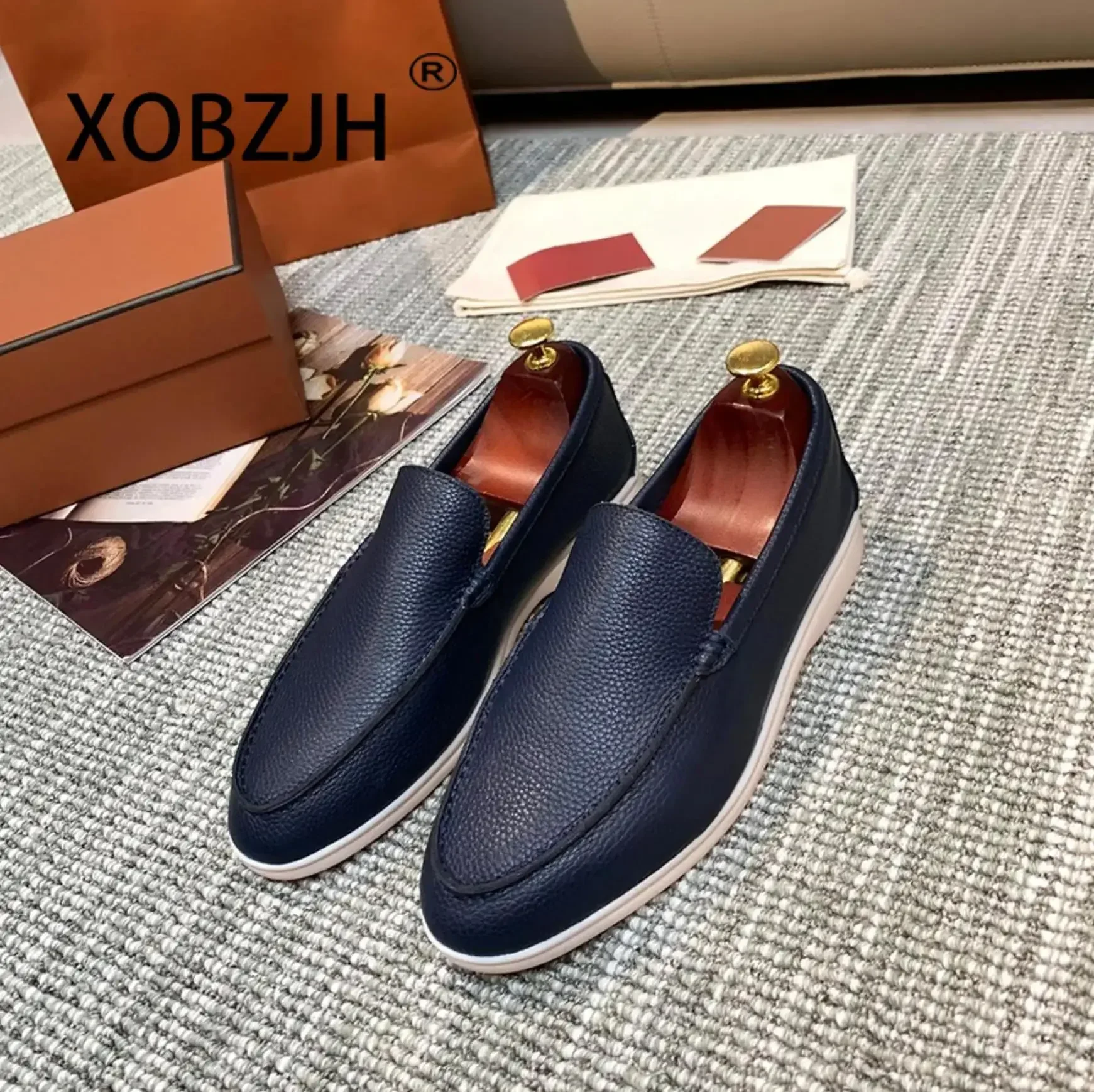 Zapatos planos de cuero de vaca negro para conductor, mocasines a la moda, zapatos para hombres y mujeres, zapatillas sin cordones de alta calidad 2024