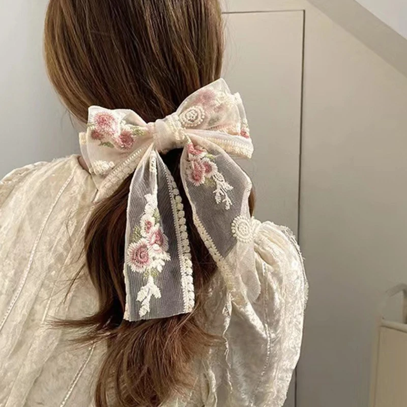 Lazos encaje Elegante Estilo los años Lazos con clip lateral Pinza para cabello Chicas dulces Flores bordadas con