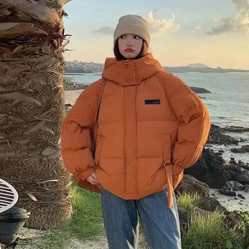 2025年冬新作 レディース 韓国風 ルーズ コットン パデッドジャケット 学生 厚手 フード付きコート 女性用ショートジャケット レディース 暖かいパーカートップス