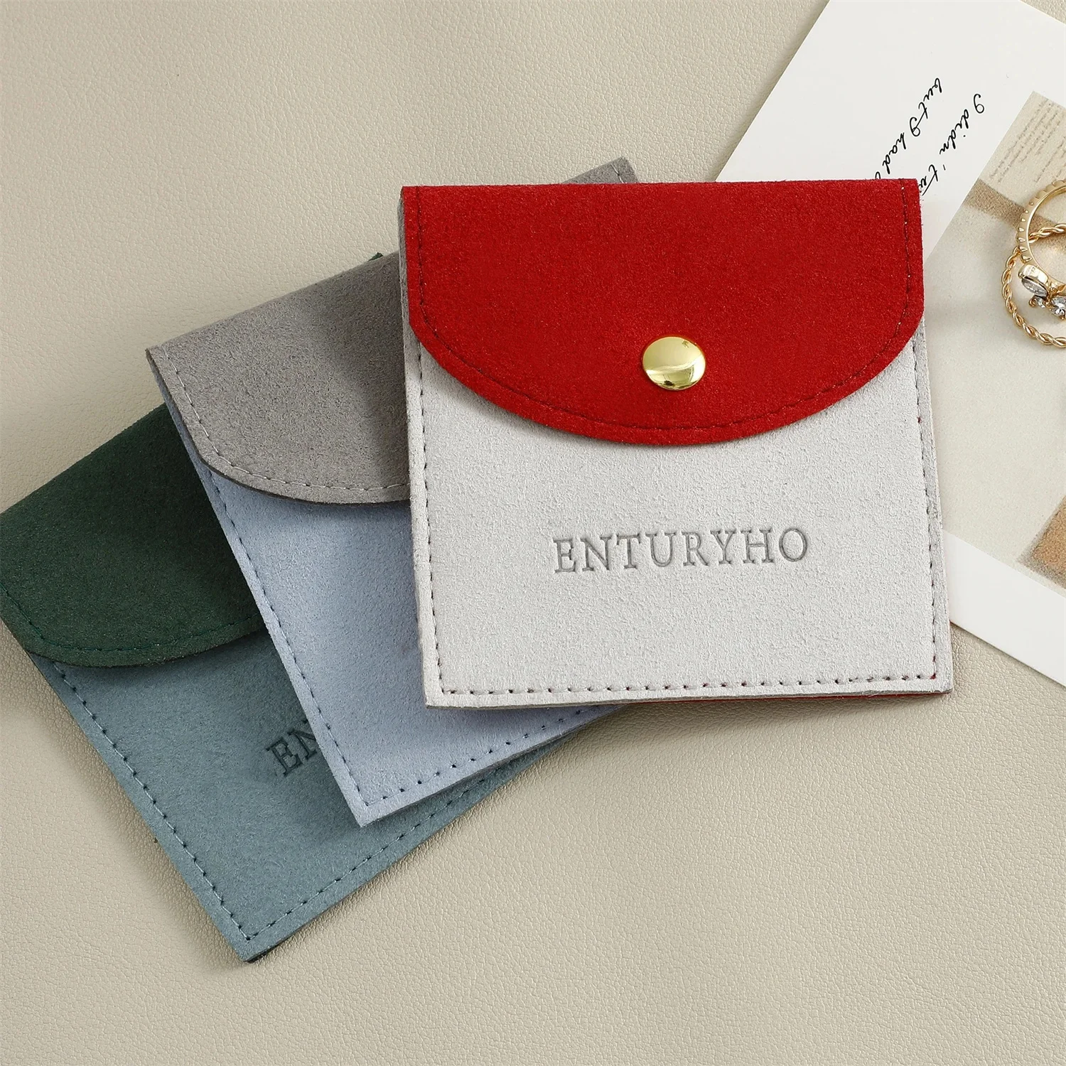 

50pcs 8×8cm Stitched Color Custom Jewelry Packaging Supplies Personalized Logo Microfiber Bag with Button Necklace Packaging Bag
